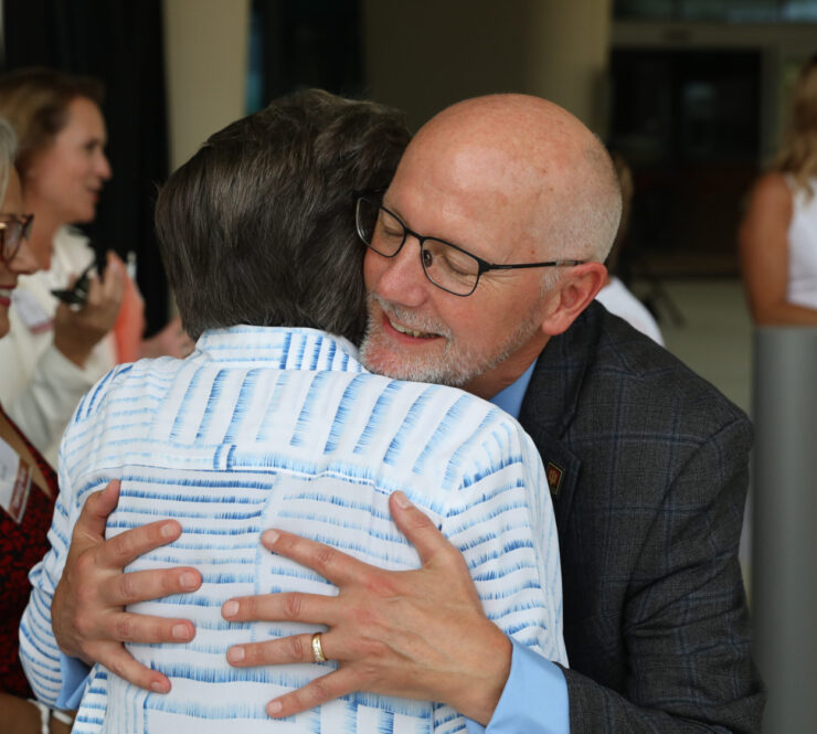 Jefferson Shreve hugging woman